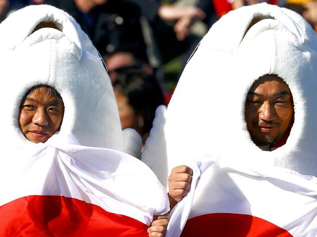 Japan fans pose for a picture before their Rugby World Cup Pool A match against Canada at McLean Park in Napier.