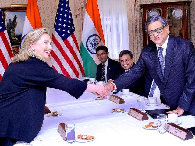 External affairs minister SM Krishna (R) shakes hands with US secretary of state Hillary Rodham Clinton before the bi-lateral meeting in New York.
