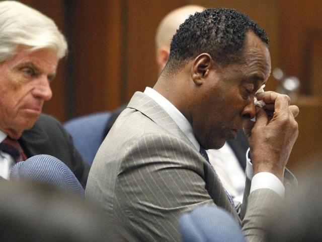 Conrad Murray wipes a tear during the defense opening arguments in his involuntary manslaughter trial at Superior Courtin Los Angeles. Murray has pleaded not guilty and faces four years in prison and the loss of his medical license if convicted of involuntary manslaughter in Michael Jackson's death.
