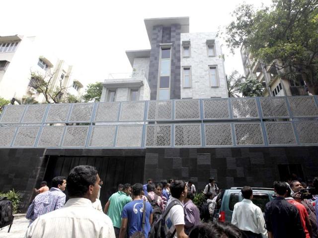 People gather outside Sachin Tendulkar's new house in Bandra area in Mumbai.