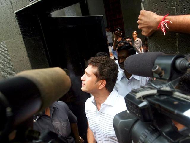 Sachin Tendulkar talks to the media after shifting to the new house at Perry Cross Road in Bandra, Mumbai.