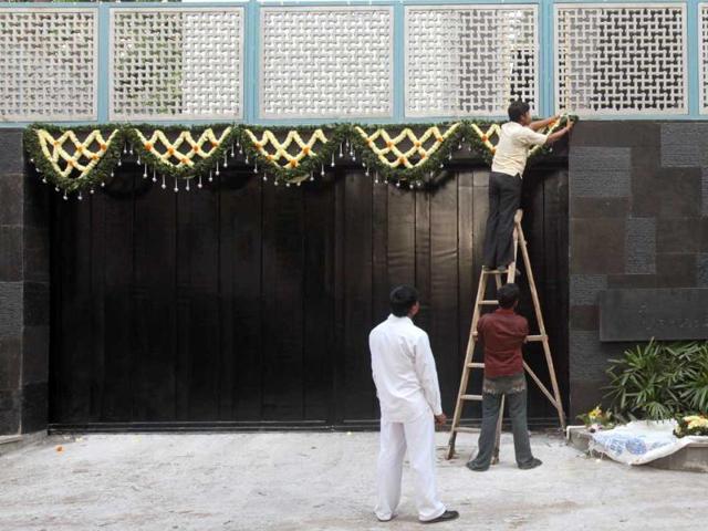 A worker gives finishing touches to Sachin Tendulkar’s new house on Perry Cross road at Bandra.