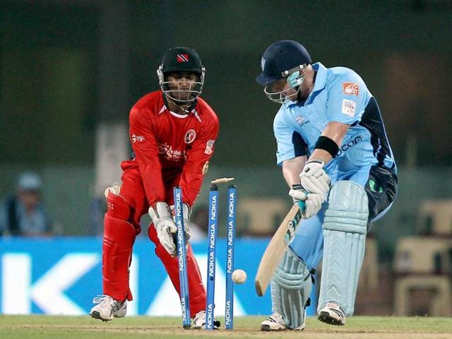 New South Wales Blues' Daniel Smith being clean bowled by Trinidad & Tobago' S Ganga during the Champions league T20-2011 match in Chennai.