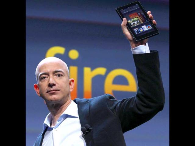 Jeff Bezos, Chairman and CEO of Amazon.com, introduces the Kindle Fire at a news conference in New York. The e-reader and tablet has a 7-inch (17.78 cm) multicolor touchscreen.