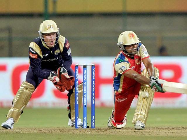 Kolkata Knight Riders' wicketkeeper Brad Haddin watches as Mohammad Kaif of Royal Challengers is bowled out leg before wicket (LBW) during the Champions League Twenty20 League cricket match between Royal Challengers Bangalore and Kolkata Knight Riders at the M. Chinnaswamy Stadium in Bangalore.