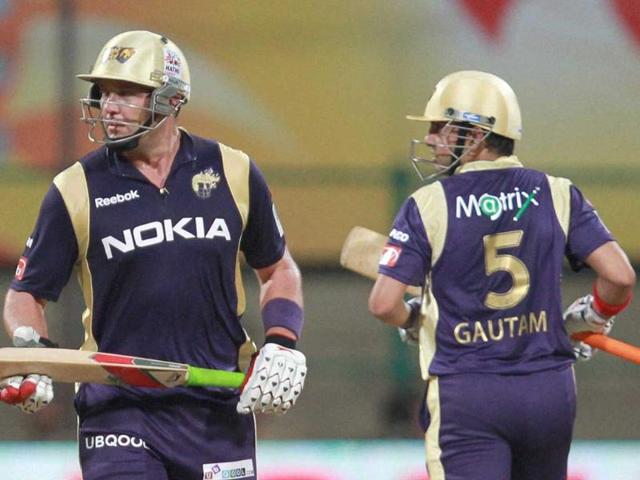 Kolkata Knight Riders' Jaquess Kallis and Skipper Gautam Gambhir run between the wickets against Royal Challengers Bangalore during the Champions league T20-2011 match in Bangalore.