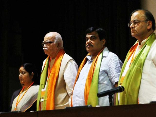 BJP president Nitin Gadkari with senior leaders L K Advani, Sushma Swaraj and Arun Jaitley during party's national executive meeting in New Delhi.