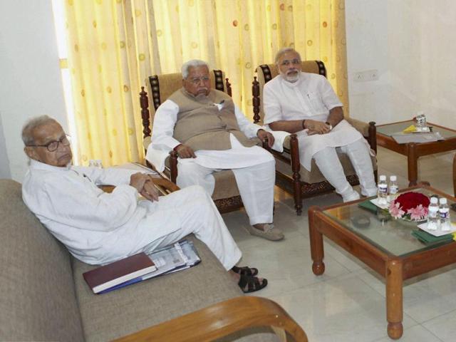 Gujarat chief minister Narendra Modi and senior party leader Keshubhai Patel attend a meeting of Somnath Trust in Gandhinagar.