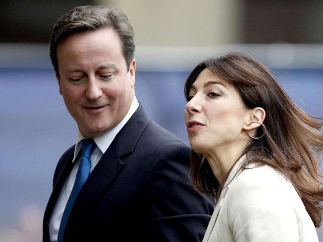 Britain-s-Prime-Minister-David-Cameron-and-his-wife-Samantha-arrive-back-at-their-hotel-on-the-first-day-of-the-Conservative-Party-s-annual-conference-in-Manchester Britain-s-Prime-Minister-David-Cameron-and-his-wife-Samantha-arrive-back-at-their-hotel-on-the-first-day-of-the-Conservative-Party-s-annual-conference-in-Manchester