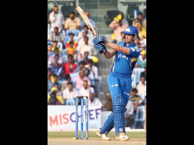 Mumbai Indians batsman James Franklin plays a shot during the CLT20 match against New South Wales at the MA Chidambaram Stadium in Chennai.