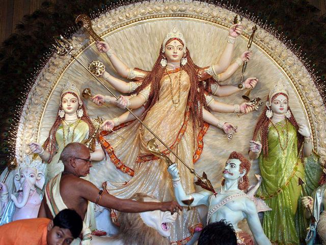 A priest performing puja on the Maha Saptami day,the first day of the Durga puja in Kolkata.
