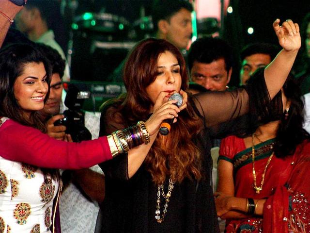 Actress Raveena Tandon enjoys herself at the Navratri celebration.