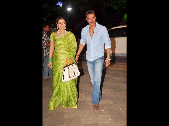 Actors Kajol and Ajay Devgn arrive at Sanjay Dutt's Mata Ki Chowki.
