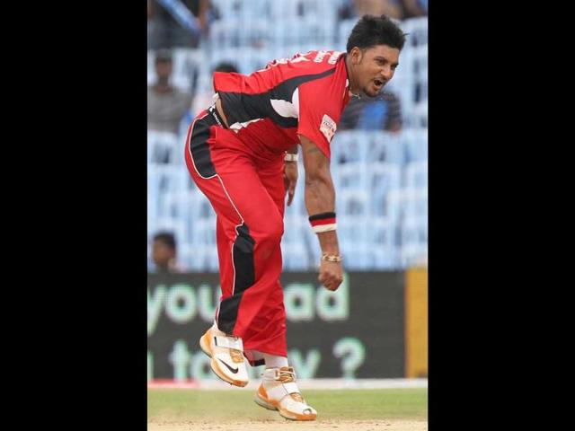 Trinidad and Tobago's Ravi Rampaul bowls during their Champions League Trophy T20 Cricket match against Cape Cobras at MA Chidambaram Stadium in Chennai.