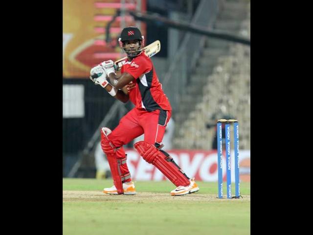 Darren Bravo of Trinidad and Tobago plays a shot against Cape Cobras during their Champions League Trophy T20 cricket match at MA Chidambaram Stadium in Chennai.