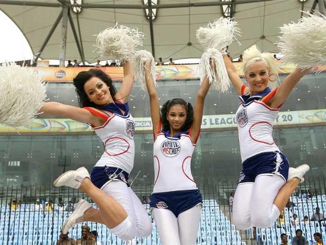 Cheerleaders perform during the Champions League T20 match between Cape Cobras and Trinidad and Tobago in Chennai.
