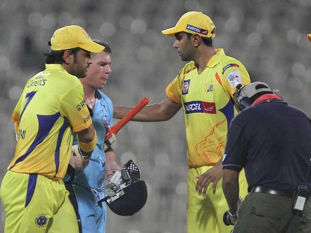 New-South-Wales-Blues-David-Warner-being-congratulated-by-Chennai-Super-Kings-skipper-MS-Dhoni-and-his-teammates-during-their-Champions-League-T20-2011-match-in-Chennai
