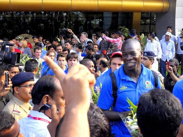 Players of the Blackburn Rovers FC arrive for an exhibition match at the airport in Pune.