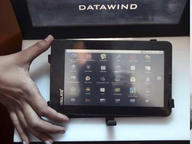 A-DataWind-representative-displays-the-supercheap-Aakash-Tablet-computers-during-its-launch-in-New-Delhi A-DataWind-representative-displays-the-supercheap-Aakash-Tablet-computers-during-its-launch-in-New-Delhi