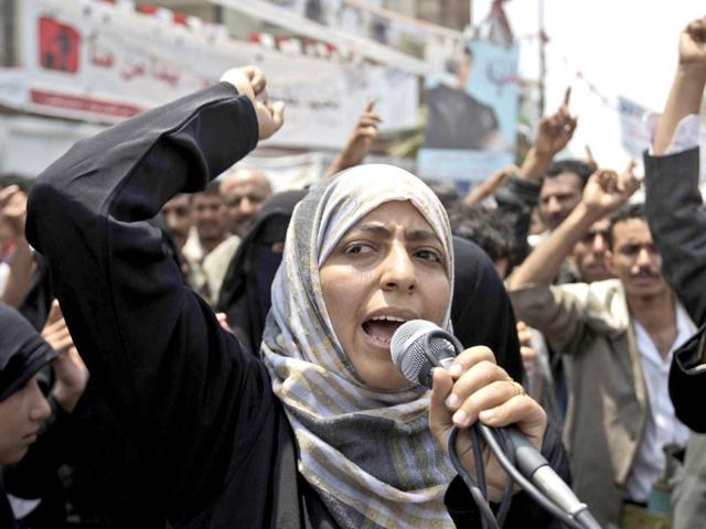 File photo of Yemeni activist and Nobel Laureate Tawakkul Karman chanting slogans along with anti-government protestors, during a demonstration demanding the resignation of Yemeni President Ali Abdullah Saleh, in Sanaa, Yemen.