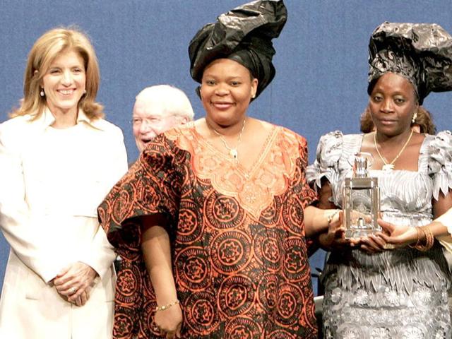 File photo of peace activist and Nobel Laureate Leymah Gbowee (C) accepting an award at the John F Kennedy Presidential Library and Museum in Boston, Massachusetts.