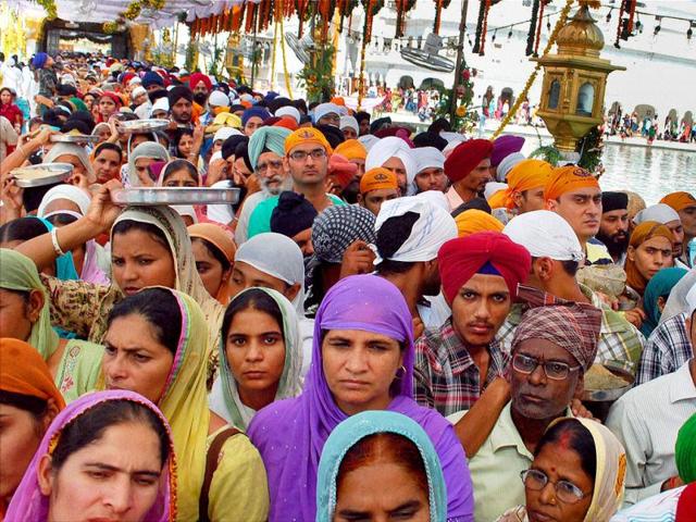 Devotees pay obeisance at Golden Temple on the occasion of birth Anniversary of fourth Sikh Guru– Guru Ramdass Ji, founder of Amritsar city, in Amritsar on Sunday.