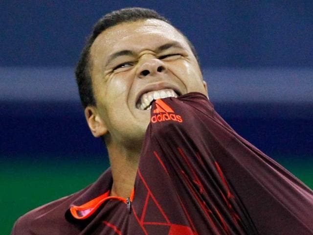 Jo-Wilfried-Tsonga-of-France-reacts-during-his-match-against-Kei-Nishikori-of-Japan-at-the-Shanghai-Masters-tennis-tournament Jo-Wilfried-Tsonga-of-France-reacts-during-his-match-against-Kei-Nishikori-of-Japan-at-the-Shanghai-Masters-tennis-tournament