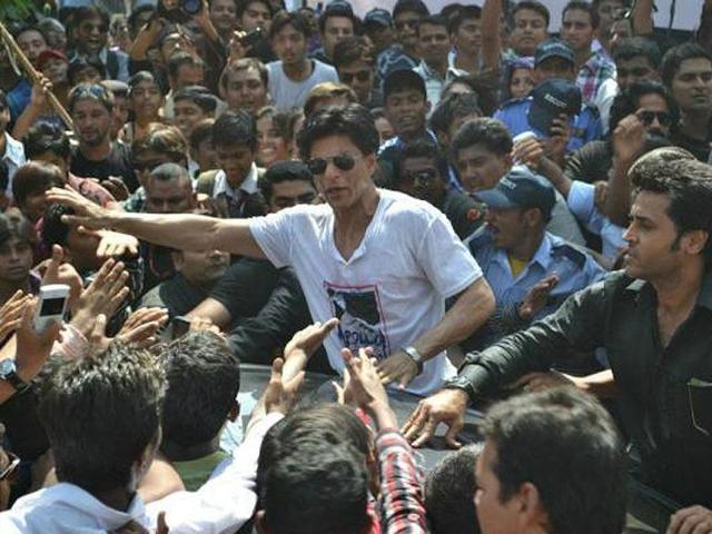 Shah Rukh Khan is surrounded by his fans at the event.