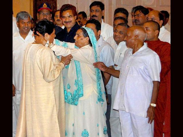 Uttar Pradesh chief minister Mayawati is blessed by her mother during the inauguration of the Rashtriya Dalit Prerna Sthal, Ambedkar Park in Noida on Friday. (Photo: PTI)
