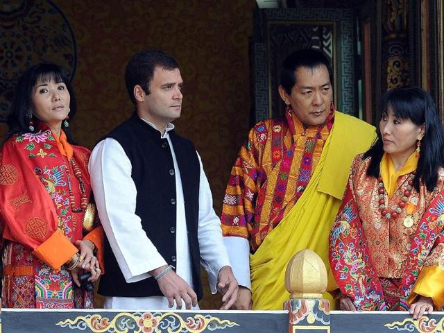 Former King of Bhutan Jigme Sinagye Wangchuk talks with Rahul Gandhi during a ceremony for the newly wed Bhutanese royal couple at the main stadium in Thimphu.