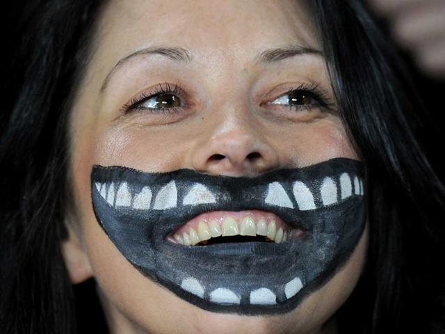 A New Zealand All Blacks fan attends the 2011 Rugby World Cup semi-final match Australia vs New Zealand at Eden Park Stadium in Auckland.