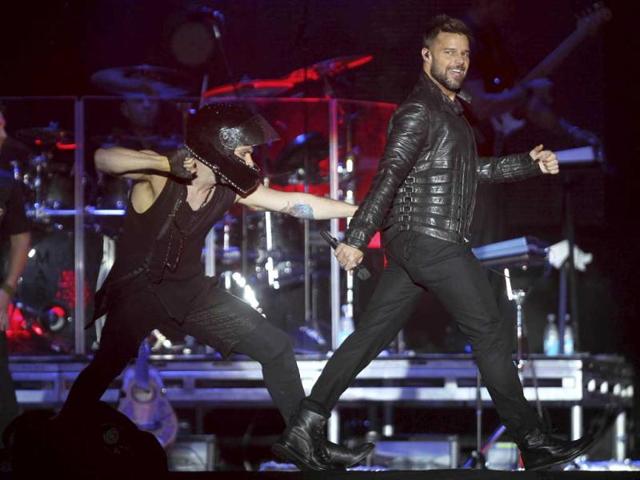 Puerto Rican singer Ricky Martin performs during his concert tour titled "M.A.S." (Music + Soul + Sex) in Tegucigalpa