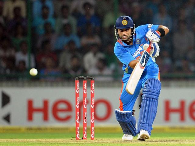 Virat Kohli plays a shot during the second One-Day International cricket match between India and England at the Ferozeshah Kotla stadium in New Delhi.