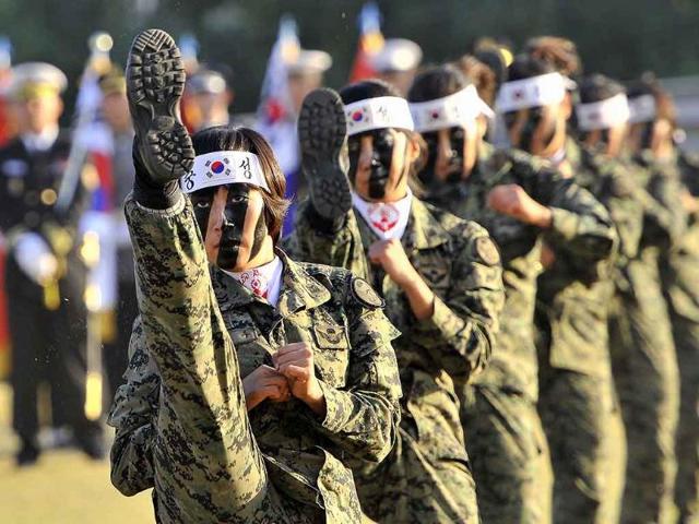 South Korean army special forces soldiers perform martial arts during a welcoming ceremony for the Seoul International Aerospace and Defense Exhibition at the Defense Ministry in Seoul.