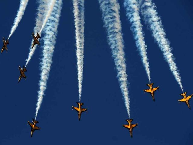 The Black Eagles, an aerobatic team of T-50 jets belonging to South Korea's Air Force, fly in formation during the opening of the Seoul International Aerospace and Defense Exhibition 2011 at the Seoul Military Airport in Seongnam, south of Seoul. The exhibition opened providing marketing opportunities for defense contractors and for diplomacy among military leaders on hand, organizers said.