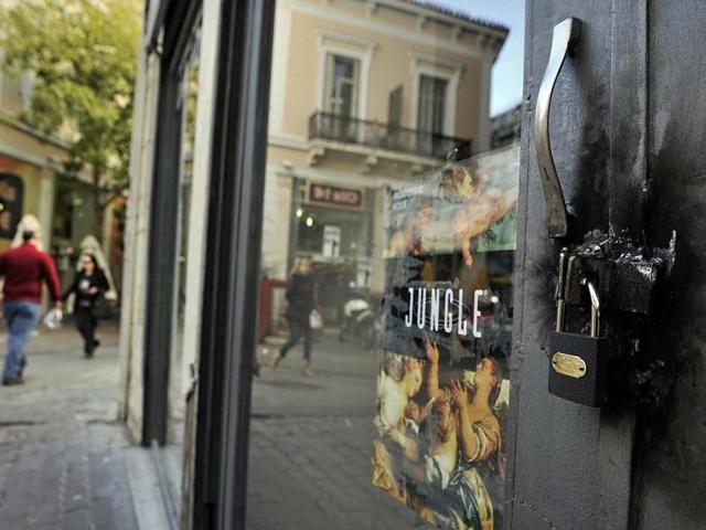 A shop is locked down in central Athens shopping area as Greek unions launched a two-day general strike in an all-out effort to block a new austerity bill that parliament must pass this week to forestall a state bankruptcy.
