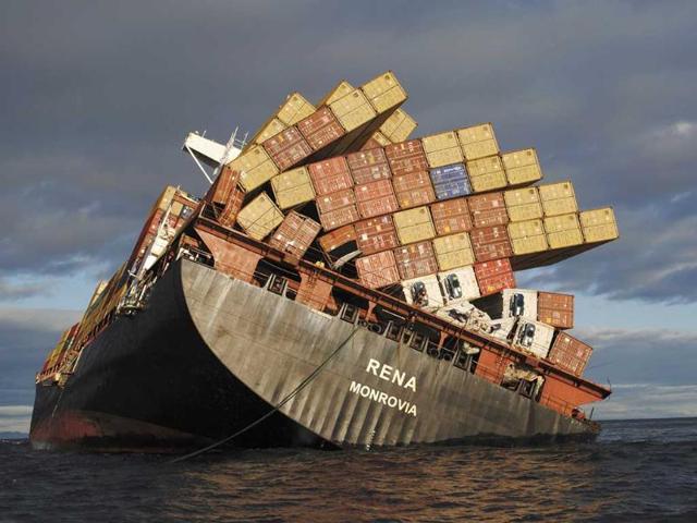 Containers on the stern deck of the 47,230 tonne Liberian-flagged Rena hang precariously, about 12 nautical miles from Tauranga, on the east coast of New Zealand's North Island. (Reuters)