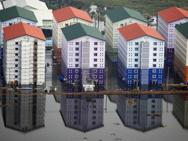 A residential area is flooded just outside Bangkok. (Reuters)