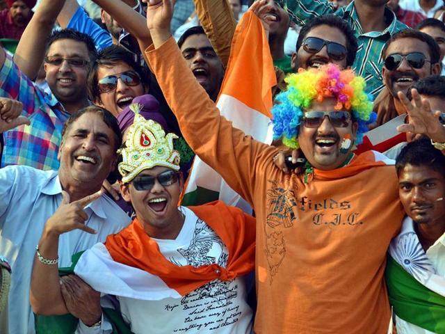 Fans cheering the team members during the third ODI one day match between India Vs England at PCA Stadium in Mohali. Photo by HT Photographer Rajnish Katyal.