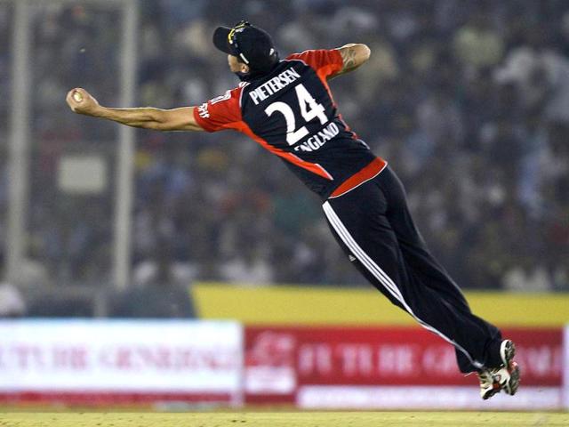England's Kevin Pietersen takes a catch to dismiss India's Gautam Gambhir during their third one-day international cricket match in Mohali.rr