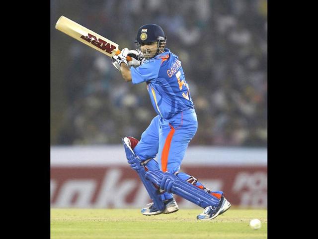 Gautam Gambhir plays a shot during India's third one-day international cricket match against England in Mohali.