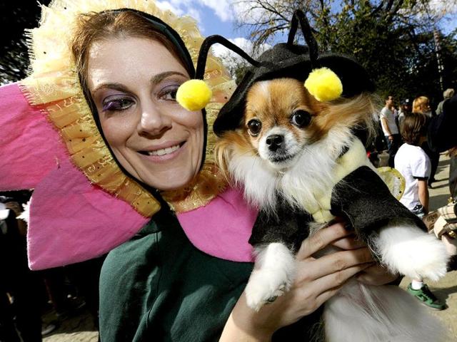 SarahPolgee and kiki during the 21st Annual Tompkins Square Halloween Dog Parade in New York. (AFP Photo)