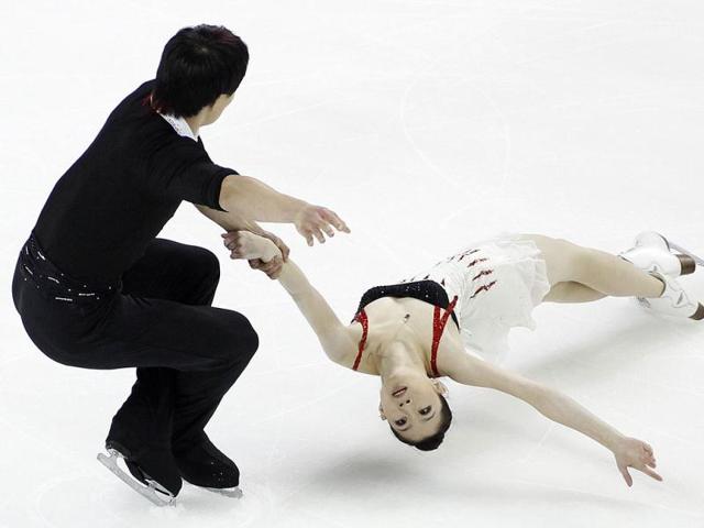 Zhang Dan and Zhang Hao of China perform during the pairs short program at the Skate America ISU Grand Prix of Figure Skating in Ontario, California.