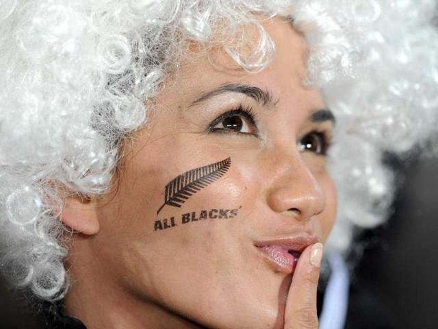 New Zealand All Black fans attend the 2011 Rugby World Cup final match New Zealand vs France at Eden Park Stadium in Auckland.