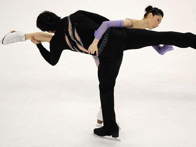Zhang Dan and Zhang Hao of China perform during the Pairs Free Skate competition at the Citizens Business Bank Arena in Ontario, California, during the 2011 ISU Grand Prix of Figure Skating competition.