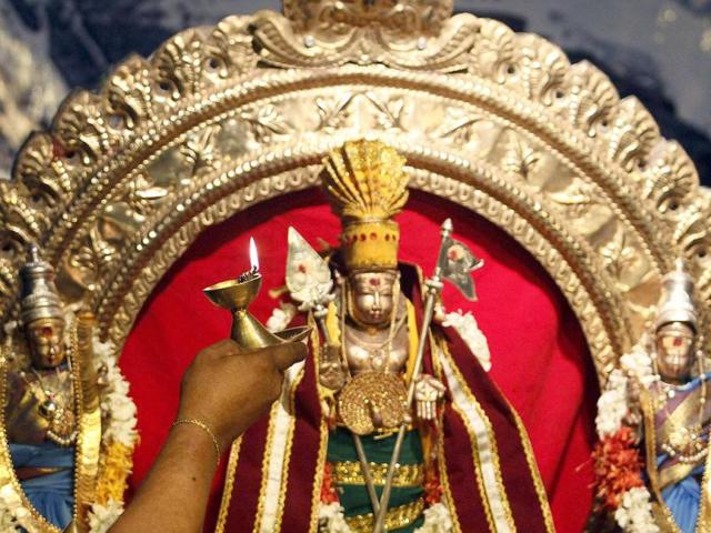 A Hindu priest makes a blessing during the festival of Diwali at Shivm Kovi temple in Colombo. Prayers and offerings are made to Hindu gods and goddesses on the occasion of Diwali, the annual festival of lights.