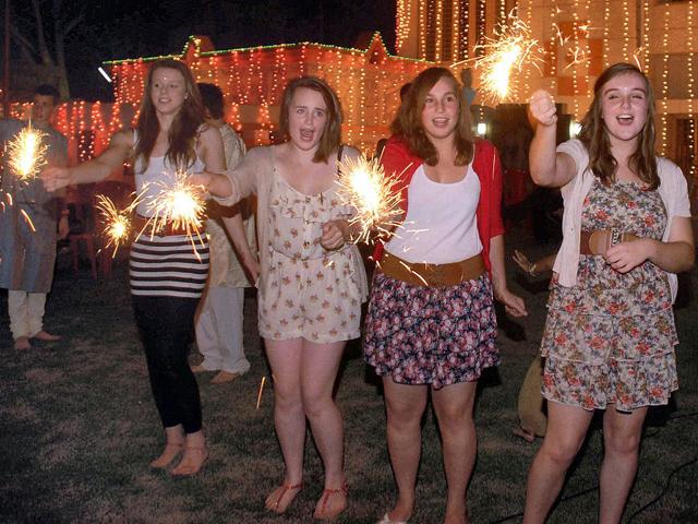 Students of Chosen Hill School, Gloucester, UK celebrate light fire crackers on the eve of 'Diwali' during their visit to participate in a student exchange programme in Bhubaneswar.