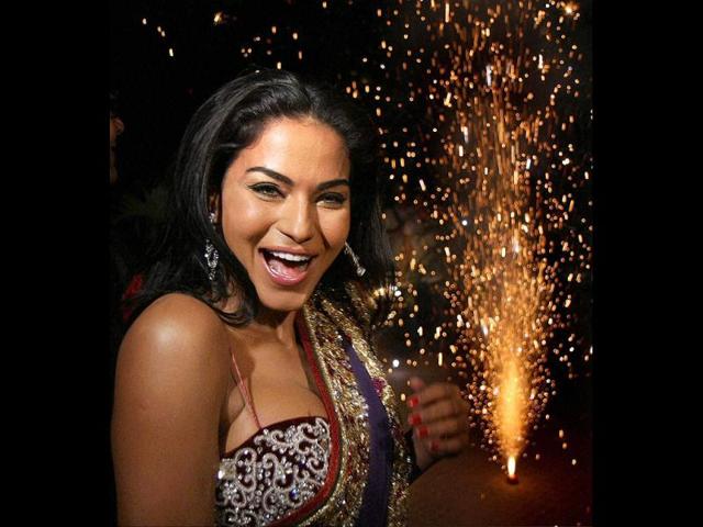 Veena clearly seems thrilled at the light of the festivities.