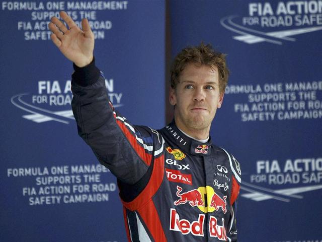 Red-Bull-driver-Sebastian-Vettel-of-Germany-waves-after-qualifying-for-the-Indian-Formula-One-Grand-Prix-at-the-Buddh-International-Circuit-in-Greater-Noida-Photo-PTI Red-Bull-driver-Sebastian-Vettel-of-Germany-waves-after-qualifying-for-the-Indian-Formula-One-Grand-Prix-at-the-Buddh-International-Circuit-in-Greater-Noida-Photo-PTI