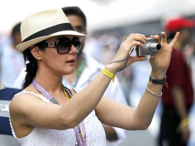 Preity Zinta spotted clicking the racing sport.
